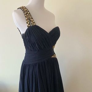 Asymmetrical jewelled fully lined dress